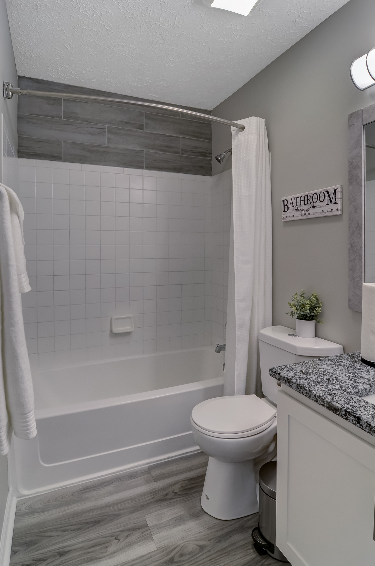 Bathroom with bathtub and shower